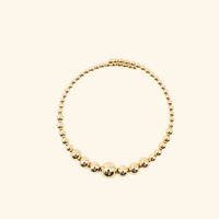 Graduated Gold Ball Bracelet Shop Jewelry pieces at MCHARMS