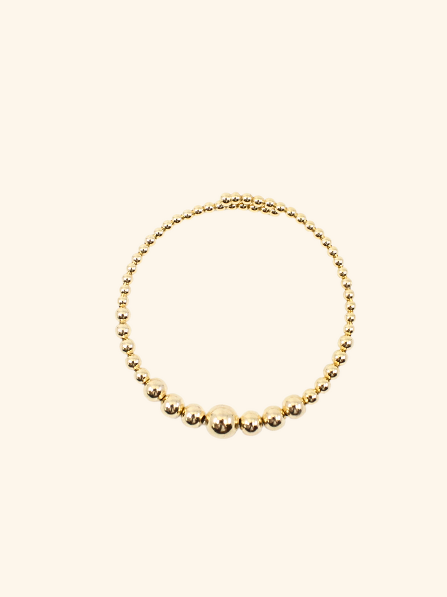 Graduated Gold Ball Bracelet Shop Jewelry pieces at MCHARMS