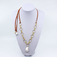 Baroque Pearl Convertible Necklace I MCHARMS Gold plated links with baroque pearl and leather strap closure. 16- 46 inches in length. Gold Necklace. Leather Necklace. Necklaces. Baroque Pearl Necklace. Handmade Jewelry. Miami Jewelry. Affordable Sustainable Jewelry. Affordable Prices. Jewellery. Jewelry stores. Shop Jewelry. MCHARMS. Charms. Handcrafted Jewelry. Jewelers. Miami based Jewelry. Miami-Based Jewelry. Customized Jewelry. Jewelry stores near me. Mcharms.