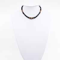 Black Tribal Puka. Stunning black puka mixed with gold plated spacers, gold plated spacers with cz detail, and brown beads. Handmade Jewelry. Stunning black and gold necklace. 16-18 inches in length. Shop Jewelry. MCHARMS. Women Necklace. Girl Necklace. Ocean Vibes. Gold Jewelry. Black Jewelry. Brown Jewelry. Miami. Miami Jewelry. Affordable Sustainable Jewelry. Affordable Prices. Jewellery. Jewelry stores. 