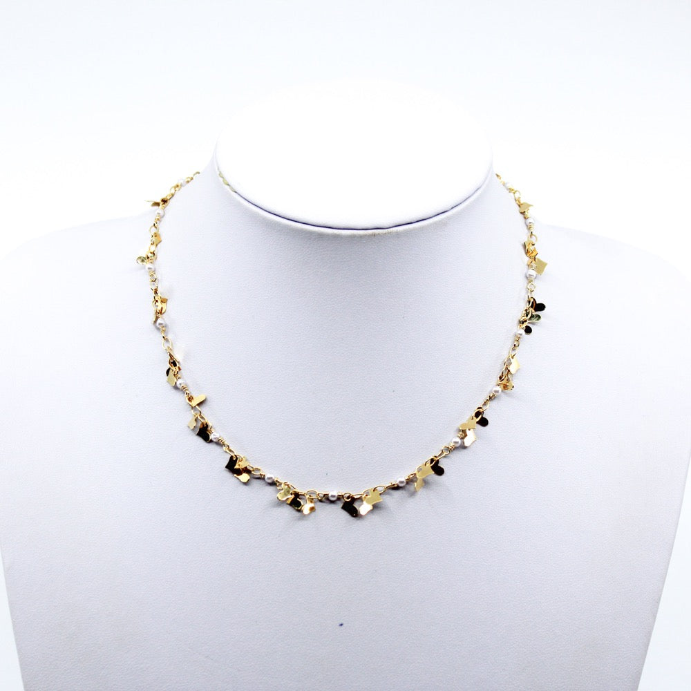 Heart Dangle Necklace. Brazilian gold plated heart chain with mini heart charms. 15-17 inches in length. Valentines Collection. Mini Gold Heart Necklace. Gold Heart Chain Necklace. Gold Necklace. Gold Choker. Heart Necklace. Heart Choker. Heart Chain Necklace with Charm/s. Heart Charm/s. Heart Charm Necklace. Handmade Jewelry. Miami Jewelry. Affordable Sustainable Jewelry. Affordable Prices. Jewellery. Jewelry stores. Shop Jewelry. MCHARMS. Charms. Charm Necklace. Necklace.