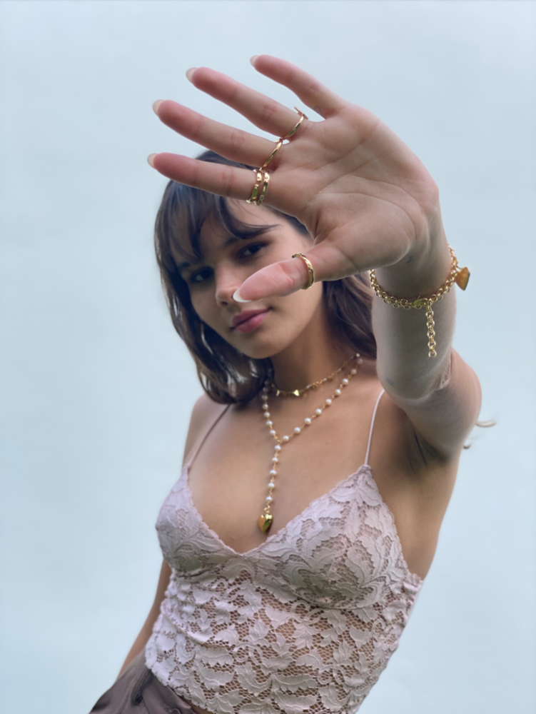 Heart Dangle Necklace. Brazilian gold plated heart chain with mini heart charms. 15-17 inches in length. Valentines Collection. Mini Gold Heart Necklace. Gold Heart Chain Necklace. Gold Necklace. Gold Choker. Heart Necklace. Heart Choker. Heart Chain Necklace with Charm/s. Heart Charm/s. Heart Charm Necklace. Handmade Jewelry. Miami Jewelry. Affordable Sustainable Jewelry. Affordable Prices. Jewellery. Jewelry stores. Shop Jewelry. MCHARMS. Charms. Charm Necklace. Necklace.