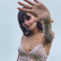 Heart Dangle Necklace. Brazilian gold plated heart chain with mini heart charms. 15-17 inches in length. Valentines Collection. Mini Gold Heart Necklace. Gold Heart Chain Necklace. Gold Necklace. Gold Choker. Heart Necklace. Heart Choker. Heart Chain Necklace with Charm/s. Heart Charm/s. Heart Charm Necklace. Handmade Jewelry. Miami Jewelry. Affordable Sustainable Jewelry. Affordable Prices. Jewellery. Jewelry stores. Shop Jewelry. MCHARMS. Charms. Charm Necklace. Necklace.