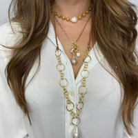 Baroque Pearl Convertible Necklace I MCHARMS Baroque Pearl Convertible Necklace I MCHARMS Gold plated links with baroque pearl and leather strap closure. 16- 46 inches in length. Gold Necklace. Leather Necklace. Necklaces. Baroque Pearl Necklace. Handmade Jewelry. Miami Jewelry. Affordable Sustainable Jewelry. Affordable Prices. Jewellery. Jewelry stores. Shop Jewelry. MCHARMS. Charms. Handcrafted Jewelry. Jewelers. Miami based Jewelry. Miami-Based Jewelry. Customized Jewelry. Mcharms.